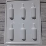 Molde plástico Plastichok para chocolate mini botellitas