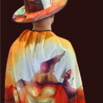 Set de capa y gorro de brujo diseño calabaza