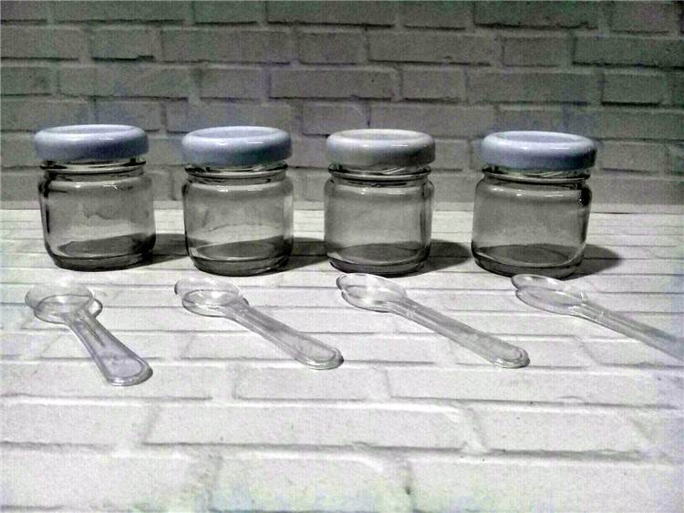 a357f1a2-5b78-4536-b2b6-5e940873b1bc Frasco de vidrio 40 cc con tapa de metal ciega x 10 con cucharita acrilica - Imagen 1